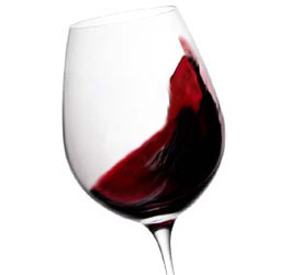 Calice di vino rosso (es. Nero d’Avola, Chianti)